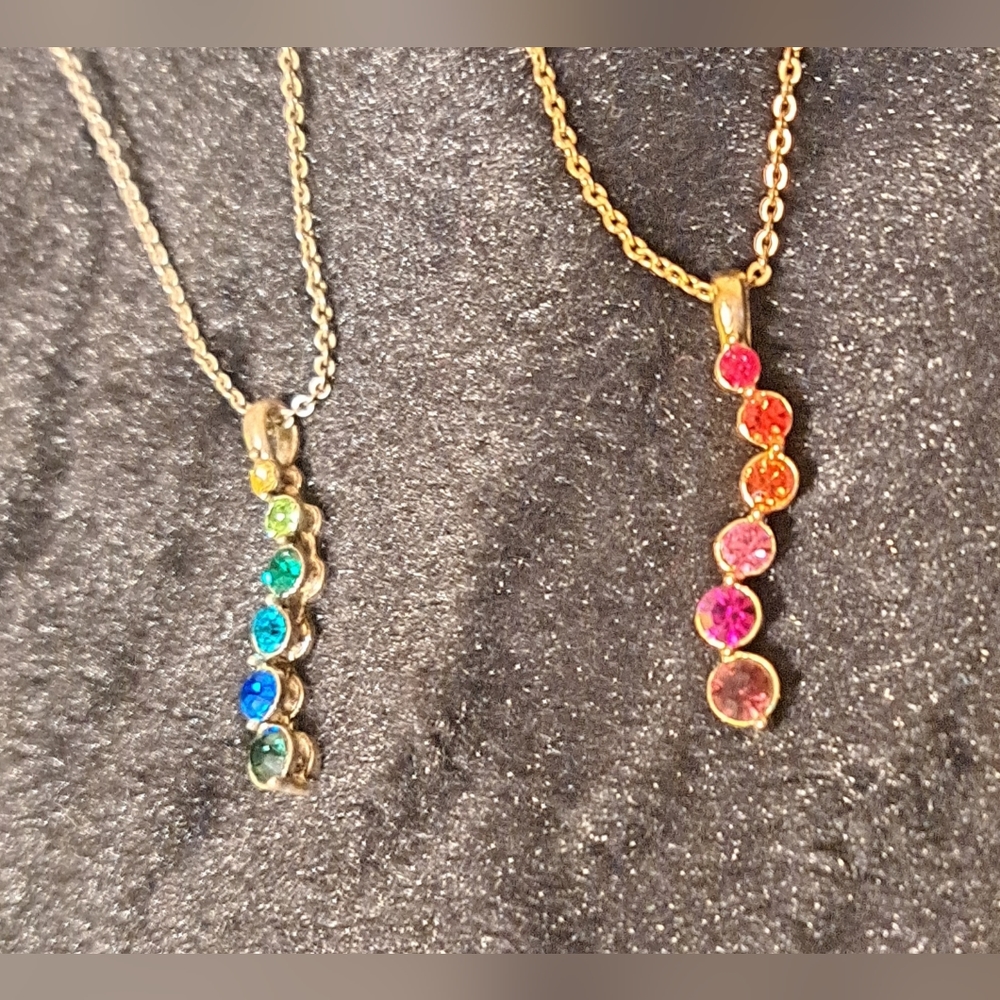 Set of warm and cool color Avon neclaces.